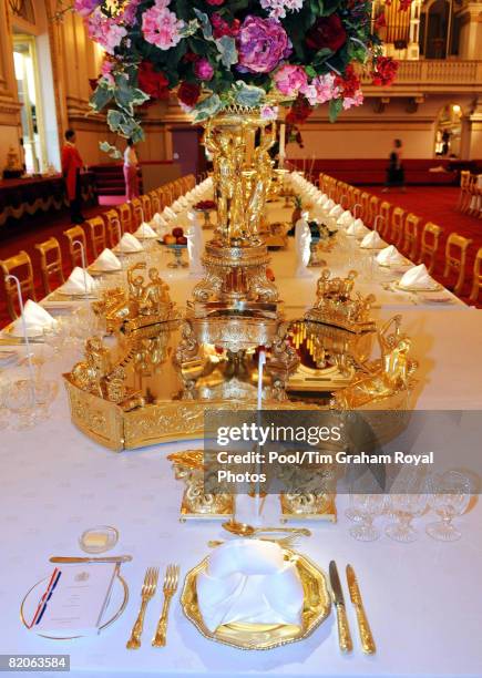 Table laid with the silver-gilt Grand Service for a State Banquet, part of the Summer Opening exhibition at Buckingham Palace, on July 25, 2008 in...
