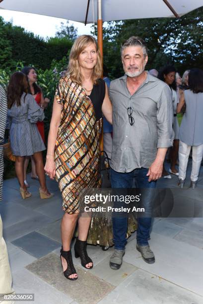 Corinne Erni and Michael Bryan attend Hamptons Event to Celebrate FIT at The Hornig Residence on July 21, 2017 in Water Mill, New York.