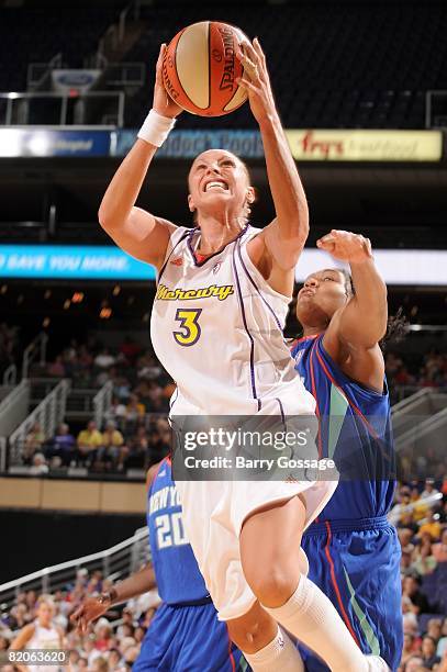 Diana Taurasi of the Phoenix Mercury goes to the basket past Erlana Larkins of the New York Liberty during the WNBA game on July 5, 2008 at US...