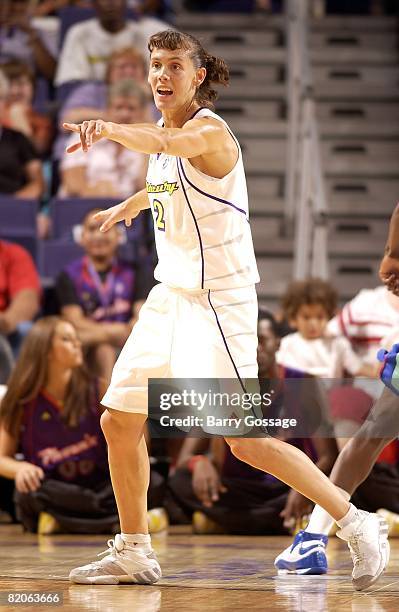 Kelly Miller of the Phoenix Mercury points across the court during the WNBA game against the New York Liberty on July 5, 2008 at US Airways Center in...