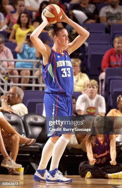 Catherine Kraayeveld of the New York Liberty looks for an open pass during the WNBA game against the Phoenix Mercury on July 5, 2008 at US Airways...
