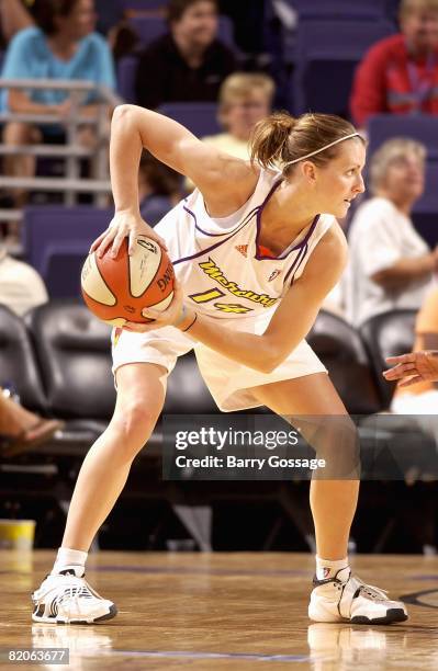 Allie Quigley of the Phoenix Mercury handles the ball during the WNBA game against the New York Liberty on July 5, 2008 at US Airways Center in...