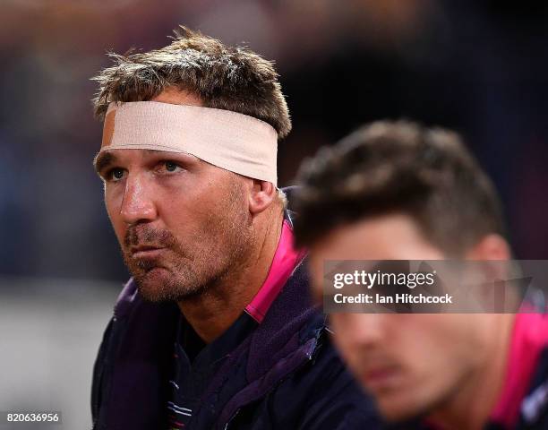 Scott Bolton of the Cowboys looks on from the bench during the round 20 NRL match between the North Queensland Cowboys and the New Zealand Warriors...