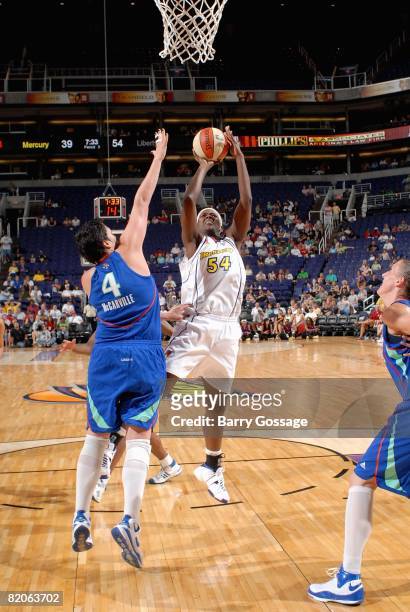 Barbara Farris of the Phoenix Mercury shoots over Janel McCarville of the New York Liberty during the WNBA game on July 5, 2008 at US Airways Center...