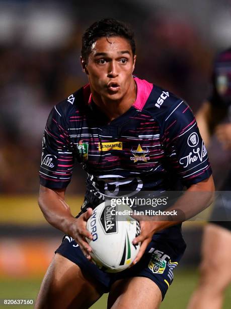 Te Maire Martin of the Cowboys runs the ball during the round 20 NRL match between the North Queensland Cowboys and the New Zealand Warriors at...