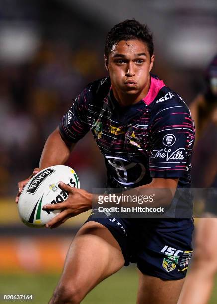 Te Maire Martin of the Cowboys runs the ball during the round 20 NRL match between the North Queensland Cowboys and the New Zealand Warriors at...