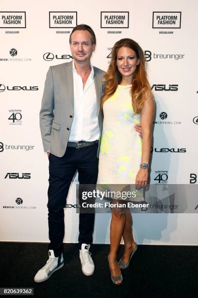 Ulli Mahler and Mara Bergmann attend the Breuninger show during Platform Fashion July 2017 at Areal Boehler on July 21, 2017 in Duesseldorf, Germany.