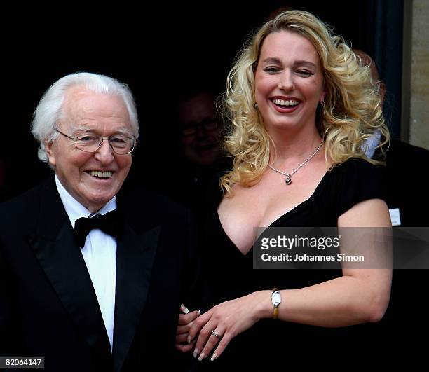Wolfgang Wagner and his grand daughter Katharina Wagner arrive for the Richard Wagner Festival on July 25, 2008 in Bayreuth, Germany.