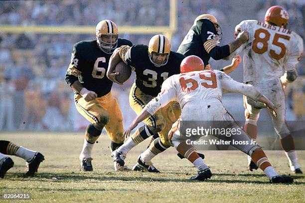 Super Bowl I: Green Bay Packers Jim Taylor in action, rushing vs Kansas City Chiefs Sherrill Headrick . Los Angeles, CA 1/15/1967 CREDIT: Walter...