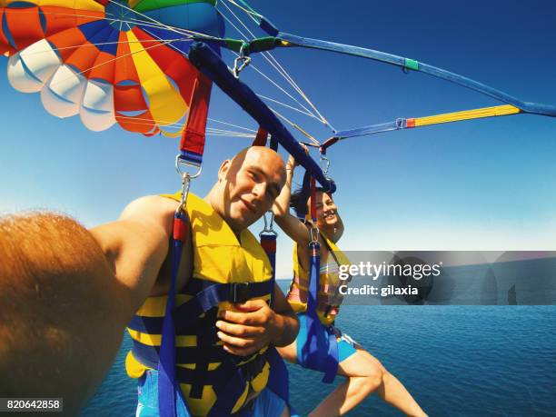 parasailing. - parasailing stock pictures, royalty-free photos & images