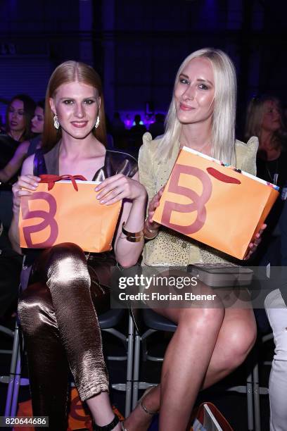 Veit Alex and Nina Bauer attend the Breuninger show during Platform Fashion July 2017 at Areal Boehler on July 21, 2017 in Duesseldorf, Germany.