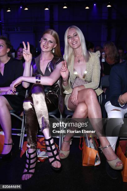 Veit Alex and Nina Bauer attend the Breuninger show during Platform Fashion July 2017 at Areal Boehler on July 21, 2017 in Duesseldorf, Germany.