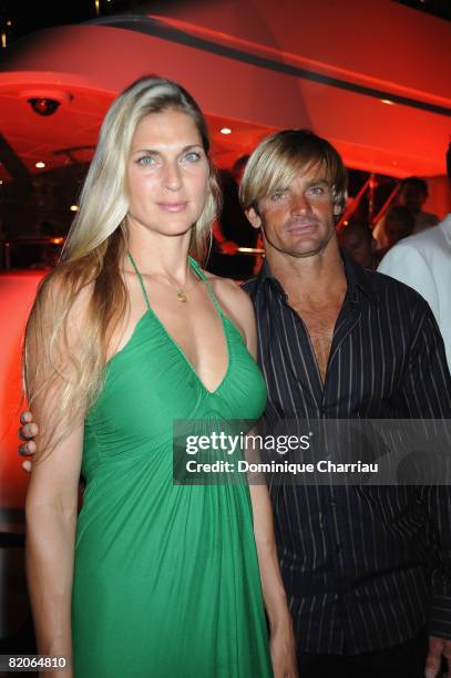 Laird Hamilton with wife Gabrielle Reece attend the 'Denise Rich and ASMALLWORLD and Turks and Caicos host Soiree Tropezienne' in St Tropez on July...