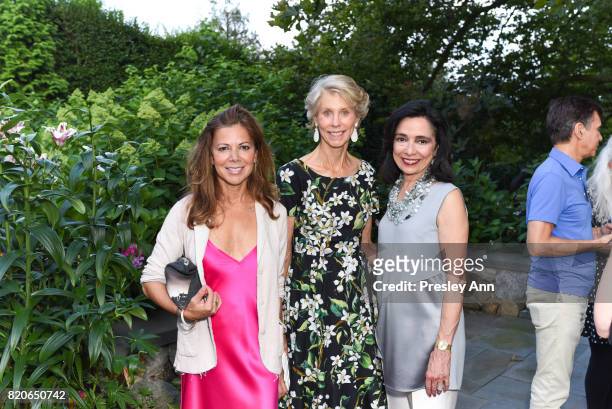 Karen Meel Joan Steinberg and Joyce Brown attend Hamptons Event to Celebrate FIT at The Hornig Residence on July 21, 2017 in Water Mill, New York.