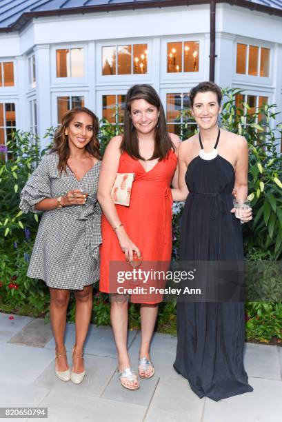 Anita Umarji, Katie Peek Tochilin and Elizabeth Musmanno attend Hamptons Event to Celebrate FIT at The Hornig Residence on July 21, 2017 in Water...