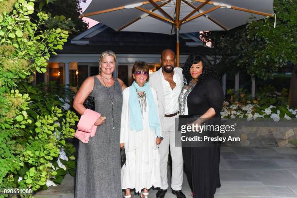 Guests attend Hamptons Event to Celebrate FIT at The Hornig Residence on July 21, 2017 in Water Mill, New York.