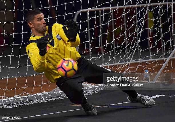 Liverpool goalkeeper David James makes the winning save during the match between the Liverpool Legend and the Manchester United Legends at Titanium...