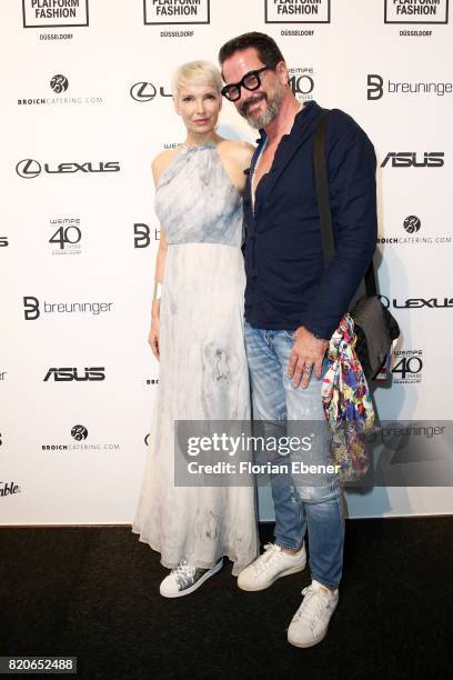 Britt and Alex Jolig attend the Breuninger show during Platform Fashion July 2017 at Areal Boehler on July 21, 2017 in Duesseldorf, Germany.