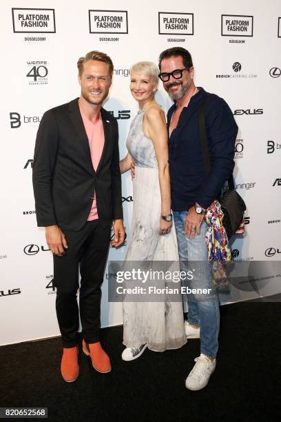 Nico Schwanz and Britt and Alex Jolig attend the Breuninger show during Platform Fashion July 2017 at Areal Boehler on July 21, 2017 in Duesseldorf,...