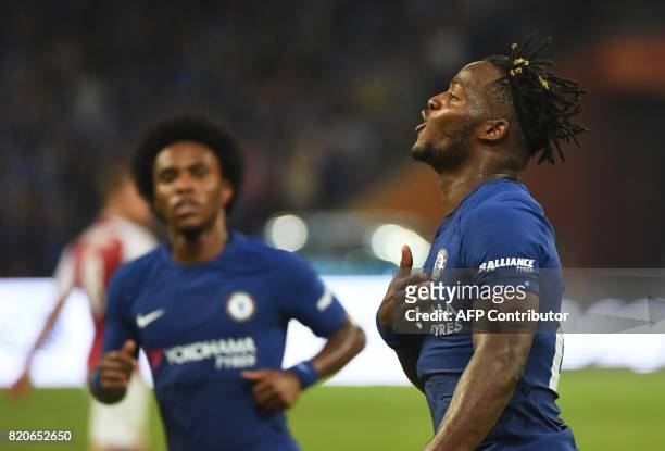 Chelsea's Michy Batshuayi celebrates after scoring against Arsenal during their pre-season friendly football match at Beijing's National Stadium,...
