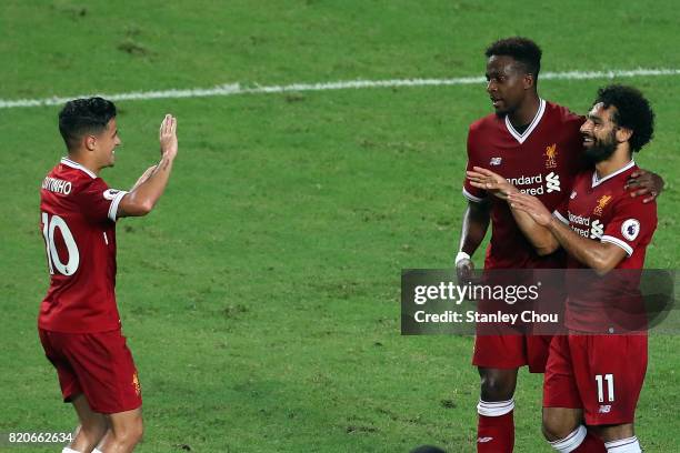 Mohamed Salah of Liverppol celebrates with Divock Origi as Philippe Coutinho looks on after scoring during the Premier League Asia Trophy match...