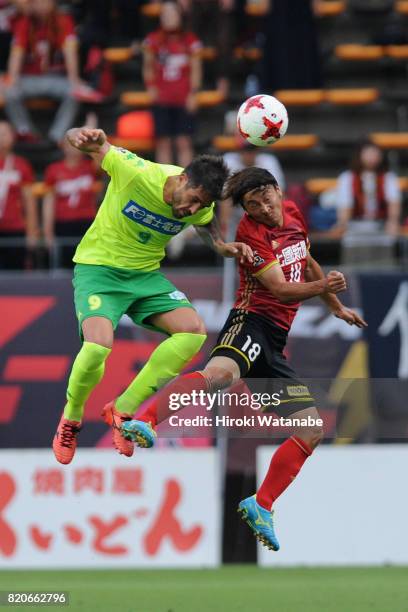 Joaquin Larrivey of JEF United Chiba and Koji Noda of Zweigen Kanagawa compete for the ball during the J.League J2 match between JEF United Chiba and...