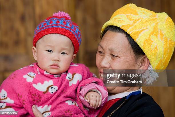 Grandmother and child from Zhuang Minority Group, Ping An, Guilin, China has a one child policy to limit population,