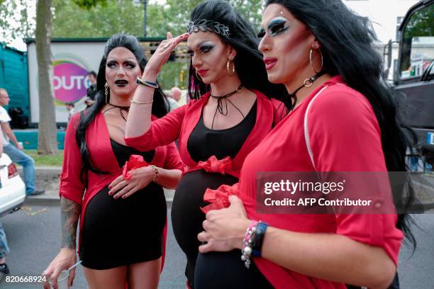 Participants pretend to be pregnant during Berlin's annual Christopher Street Day gay pride parade on July 22, 2017. Gays and lesbians all around the...