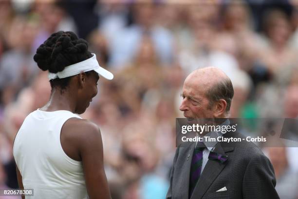 Venus Williams of The United States receives her runners up trophy from Prince Edward, Duke of Kent after the Ladies Singles Final in the Wimbledon...