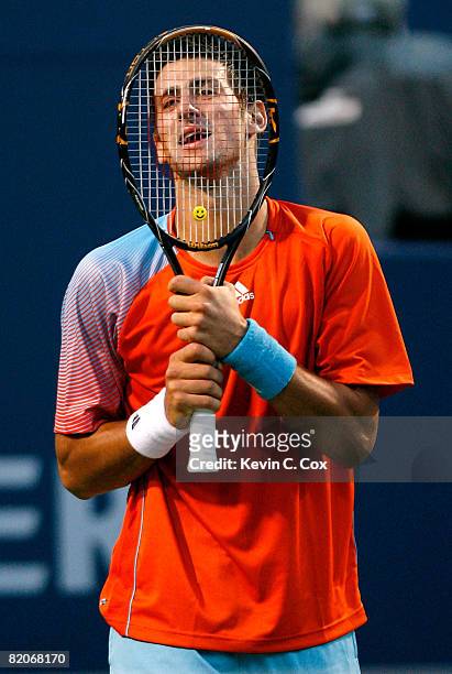 Novak Djokovic of Serbia reacts after losing a point to Andy Murray of Scotland during the Rogers Cup at the Rexall Centre at York University on July...