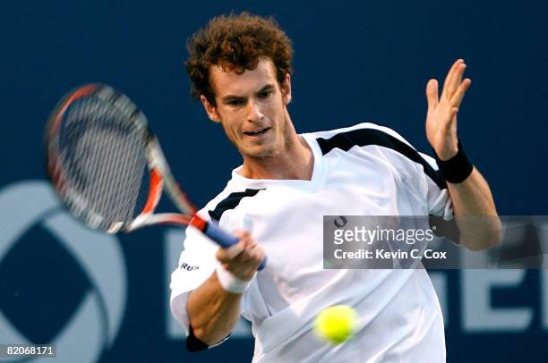 Andy Murray of Great Britain returns a shot to Novak Djokovic of Serbia during the Rogers Cup at the Rexall Centre at York University on July 25,...