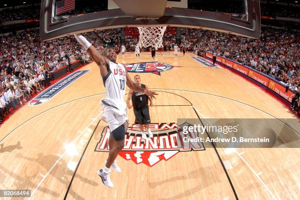 Kobe Bryant of the USA Basketball Men's Senior National Team gets to the hoop for a dunk against the Canadian National Team during the State Farm USA...