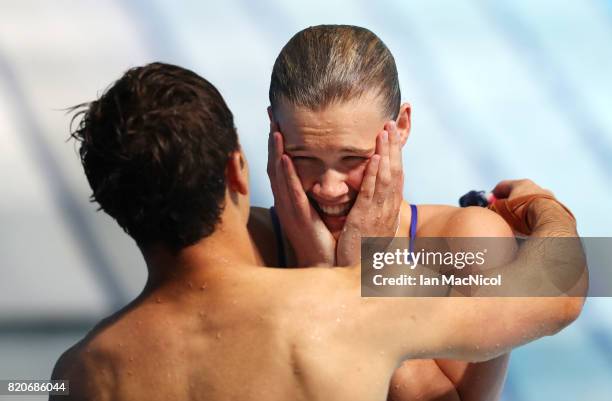 Tom Daley and Grace Reid of Great Britain react after winning silver in the Mixed 3m Synchro Springboard during day nine of the FINA World...