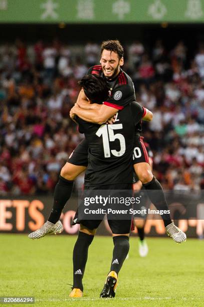 Milan Midfielder Hakan Calhanoglu celebrating his goal with his teammate AC Milan Defender Gustavo Gomez during the 2017 International Champions Cup...