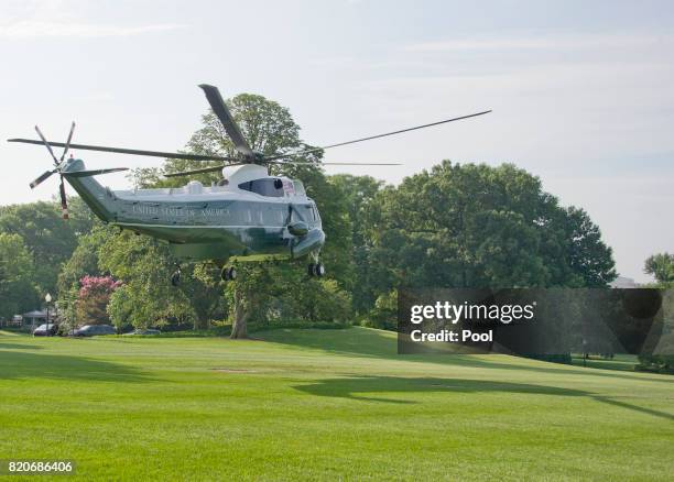 Marine One, with U.S. President Donald Trump aboard, departs the White House to transport the President to Norfolk, Virginia where he will...