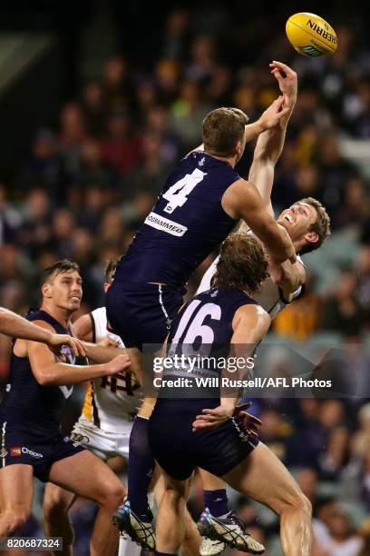 Sean Darcy of the Dockers contests a ruck with Ben McEvoy of the Hawks during the round 18 AFL match between the Fremantle Dockers and the Hawthorn...