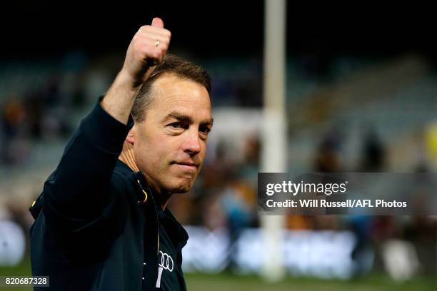 Alastair Clarkson, Senior Coach of the Hawks acknowledges the crowd after his 300th game as coach during the round 18 AFL match between the Fremantle...