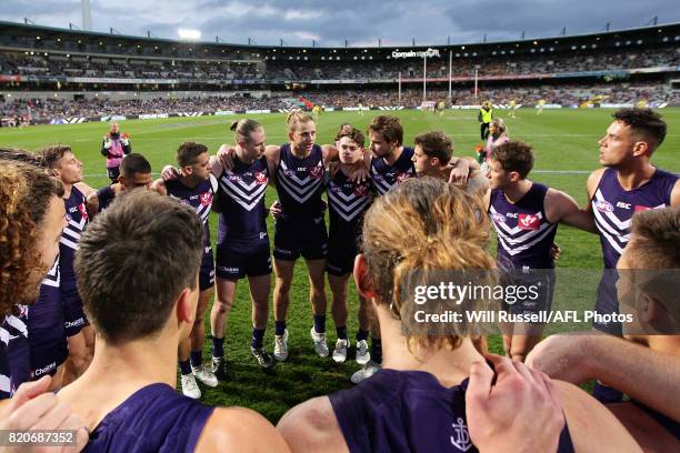 Nat Fyfe of the Dockers speaks to the huddle at the start of the game during the round 18 AFL match between the Fremantle Dockers and the Hawthorn...