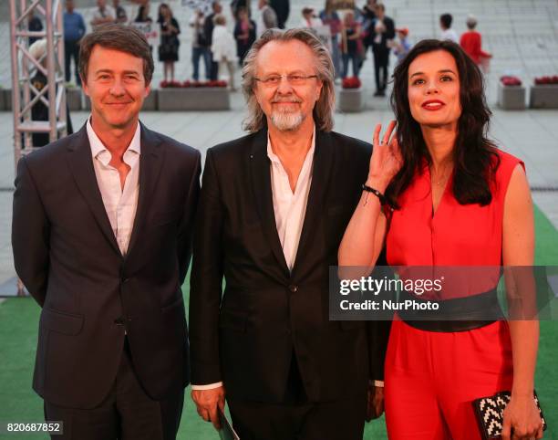 American actor Edward Norton and Polish music composer Jan A.P. Kaczmarek with his wife at the 7th Transatlantyk Film Festival in Lodz, Poland on 21...