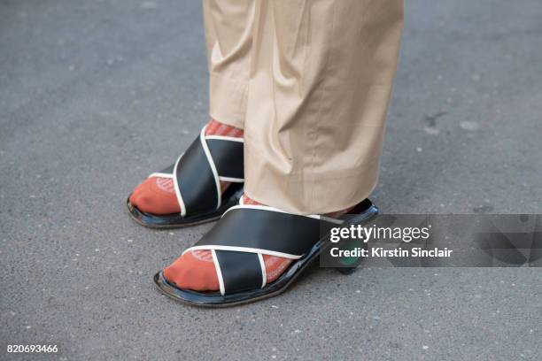 Guest wears JW Anderson shoes on day 3 during Paris Fashion Week Autumn/Winter 2017/18 on March 2, 2017 in Paris, France.