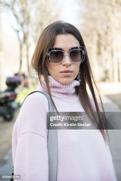 Editor in chief of l"u2019OFFICIEL Ukraine, Ulyana Boyko wears a Céline sweater on day 3 during Paris Fashion Week Autumn/Winter 2017/18 on March 2,...