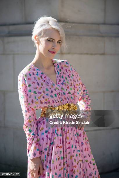 Singer Aria Crescendo wears a Manish Arora dress on day 3 during Paris Fashion Week Autumn/Winter 2017/18 on March 2, 2017 in Paris, France.