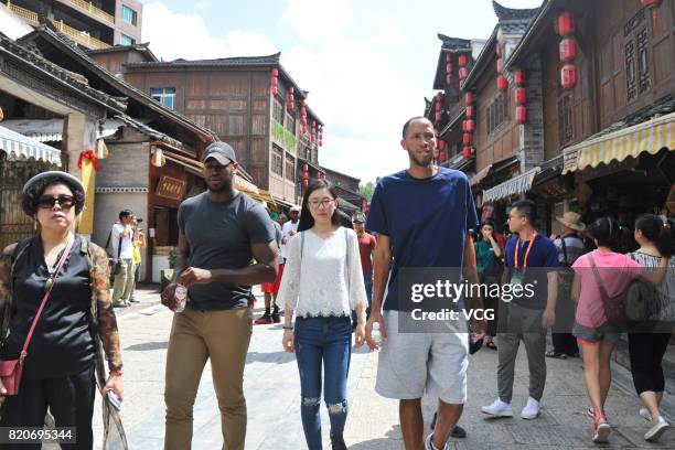 Player Tayshaun Prince visits the Xiasi ancient town on July 22, 2017 in Kaili, China.