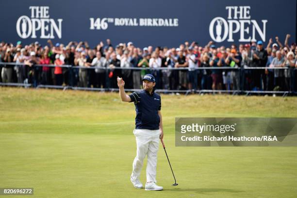 Branden Grace of South Africa acknowledges the crowd on the 18th green after shooting a 62 the lowest round in major championship history during the...