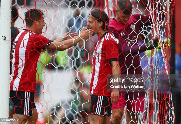 Lasse Vibe of Brentford celebrates scoring a goal during the Pre Season Friendly match between Brentford and Southampton at Griffin Park on July 22,...