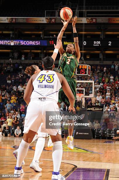 Swin Cash of the Seattle Storm shoots against Diana Taurasi of the Phoenix Mercury on July 25 at U.S. Airways Center in Phoenix, Arizona. NOTE TO...