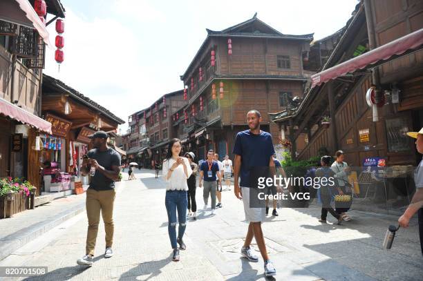 Player Tayshaun Prince visits the Xiasi ancient town on July 22, 2017 in Kaili, China.