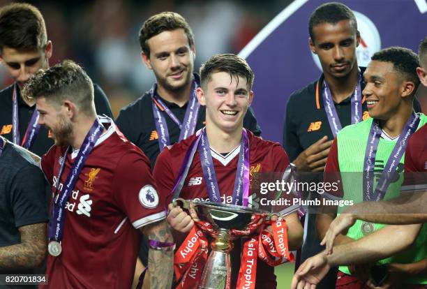 John Flanagan of Liverpool with the Premier League Asia Trophy after the Premier League Asia Trophy Final between Liverpool FC and Leicester City on...