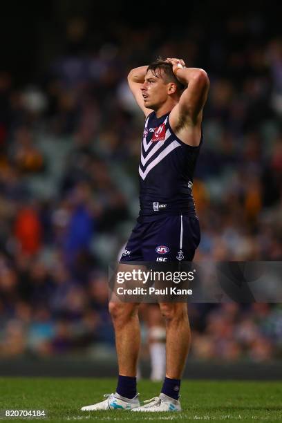 Nick Suban of the Dockers looks on at the half time break during the round 18 AFL match between the Fremantle Dockers and the Hawthorn Hawks at...