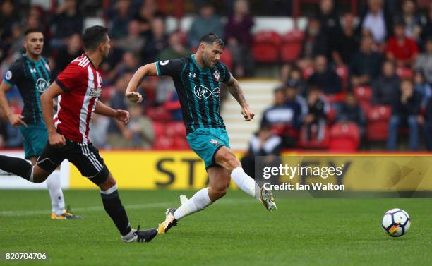 Charlie Austin of Southampton scores a goal during the Pre Season Friendly match between Brentford and Southampton at Griffin Park on July 22, 2017...